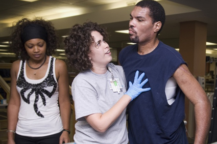 Recovery and Rehabilitation Nurse helping man walk