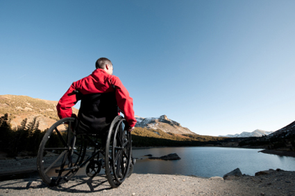 The Manual Wheelchair Man in wheelchair looking out at a lake